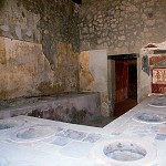 Pompeii bar. Themopolium of the Lararium.
